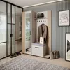 A modern entryway with a wardrobe set, mirror, and coat rack. Produktbild-Vorschau