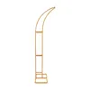 A gold-colored metal stand with a curved top, designed for decorative purposes. Podgląd zdjęcia produktu
