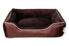 A brown dog bed with white trim, shown from a slightly elevated front-facing angle on a white background. Produktbild-Vorschau