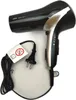A black and silver Braun Satin Hair 7 hair dryer with its power cord and a warning label. Produktbild-Vorschau