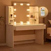 A well-lit makeup vanity with a mirror and LED lights. Produktbild-Vorschau