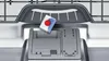 A close-up shot of a dishwasher detergent pod placed in the detergent dispenser of a dishwasher. Anteprima dell’immagine prodotto