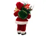 A Santa Claus figurine from behind, carrying a sack of gifts and a teddy bear. Produktbild-Vorschau