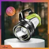 A powerful, green and black flashlight is displayed on a white pedestal against a blurred forest background. A circular graphic with a flashlight icon is in the upper left corner. Podgląd zdjęcia produktu