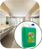 A bathroom with sinks and mirrors, with a large bottle of cleaning liquid superimposed. Náhled obrázku produktu