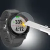 A smartwatch screen protector being tested for durability against a knife. Náhľad obrázku produktu