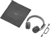 A pair of dark gray Logitech Zone Wireless 2 headphones and a carrying pouch are laid out on a white background, along with a USB-C charging cable. Voir les images du produit
