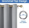 Close-up of a gray curtain with grommets hanging on a curtain rod, with a diagram showing the size of a grommet. Voir les images du produit