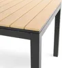 A close-up view of a table with a wooden top and black metal legs. Produktbild-Vorschau