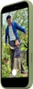 A man is taking a photo of a child with a smartphone. The phone is in a light green case. Anteprima dell’immagine prodotto