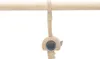 A plush toy shaped like a key hanging from a wooden bar. Produktbild-Vorschau