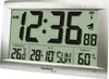 A digital wall clock displaying time, date, temperature, and humidity. Anteprima dell’immagine prodotto