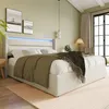 A bedroom scene featuring a bed with LED lighting, a nightstand, and artwork on the wall. Produktbild-Vorschau
