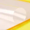 A close-up of a roll of diamond painting accessory, possibly a protective film or tape, with a yellow border visible. Produktbild-Vorschau