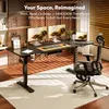 A modern home office setup with a standing desk, monitors, laptop, and ergonomic chair. Produktbild-Vorschau