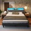 A bedroom scene with a bed as the main focus, illuminated by LED lights in the headboard. Náhled obrázku produktu