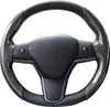 A steering wheel cover with carbon fiber accents. Náhled obrázku produktu
