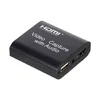 A black video capture device with ports and text on it, isolated on a white background. Produktbild-Vorschau