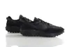 A pair of black Nike Waffle Debut sneakers are shown against a white background. Náhled obrázku produktu