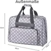 A polka dot patterned bag with dimensions shown. Produktbild-Vorschau