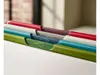 A close-up view of a set of color-coded cutting boards in a holder. Podgląd zdjęcia produktu