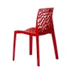 A red designer chair with a patterned back and seat, isolated on a white background. Produktbild-Vorschau