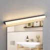 A modern LED light fixture mounted above a mirror in a bathroom. Produktbild-Vorschau