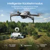 A drone flying over a campsite with a camper van and awning. Produktbild-Vorschau