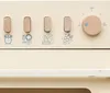 A close-up view of the control panel of a toy dishwasher, showing wooden buttons and icons. Náhľad obrázku produktu