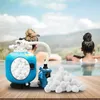 Two people relaxing in a pool with a pool filter and filter balls in the foreground. Produktbild-Vorschau