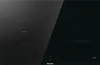 A black induction hob with four cooking zones, a reflective surface, and touch controls at the bottom. Náhľad obrázku produktu