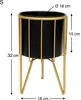 A black cylindrical planter with a gold metal stand, with dimensions indicated. Podgląd zdjęcia produktu