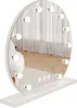 A white Hollywood-style makeup mirror with lights, placed on a white stand, with a blurred background of curtains and a wooden floor. Náhled obrázku produktu