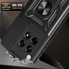 Close-up of a black phone case with a camera slider, ring stand, and textured accents, shown at an angle on a dark background. Produktbild-Vorschau