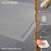 A close-up of a grey mesh pet bed with feature callouts. Produktbild-Vorschau