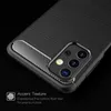 Close-up of a black phone case with a carbon fiber accent and camera module. Produktbild-Vorschau
