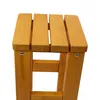 Close-up of a wooden stool on a white background. Produktbild-Vorschau