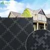 A black privacy screen fence in front of a house. Produktbild-Vorschau