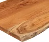 A close-up view of a wooden tabletop with a live edge. Produktbild-Vorschau