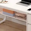 A close-up view of a white desk with a shelf underneath containing storage boxes and books. Produktbild-Vorschau