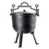 A black cast iron cooking pot with three legs and a lid, shown against a white background. Podgląd zdjęcia produktu
