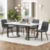 A dining room set with a rectangular table and four chairs, placed on a rug in front of windows. Podgląd zdjęcia produktu