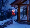 Sitzender Weihnachtsmann auf einer Schaukel | mit 20 bunten Produktbild-Vorschau 4