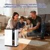 A family and their dog are in a living room with a dehumidifier. Anteprima dell’immagine prodotto