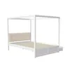 A white canopy bed frame with a beige upholstered headboard and wooden slats for a mattress, shown against a white background. Produktbild-Vorschau