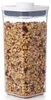 A clear, well-lit studio shot of a clear plastic food storage container filled with granola. Náhled obrázku produktu
