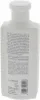 A white plastic bottle of shampoo with text on the label. Podgląd zdjęcia produktu