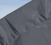 A close-up view of a gray tarp or fabric, showing its texture and folds. Produktbild-Vorschau