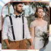 A wedding couple posing outdoors. Produktbild-Vorschau