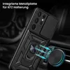 A black phone case with a ring holder and camera cover is shown attached to a car vent with a magnetic mount. Produktbild-Vorschau